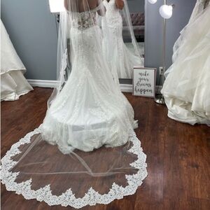 Elegant White Lace Wedding Dress without veil.